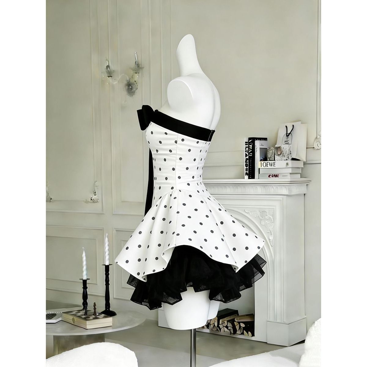 Polka dot strapless mini dress – side view showing layered black tulle hem and back zip fastening
