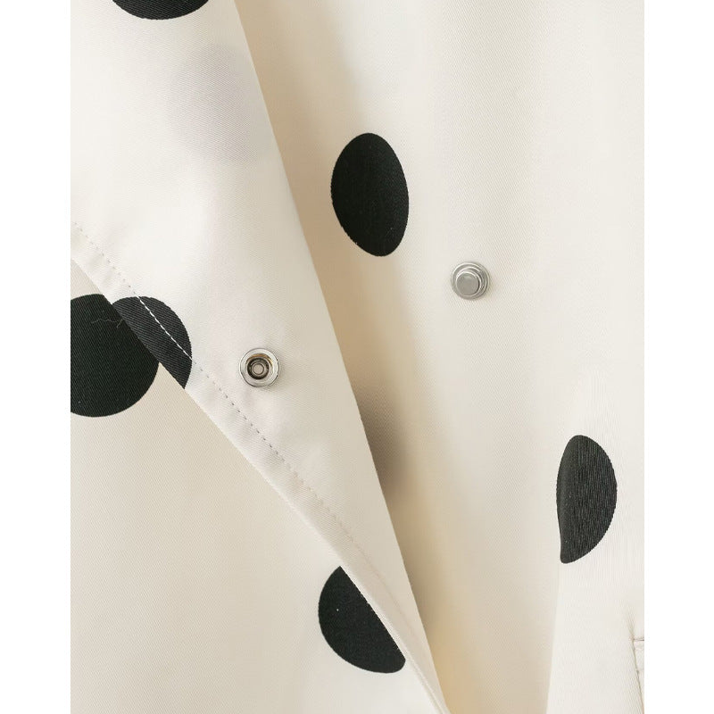 White turtleneck aviator jacket with printed polka dot design — side view