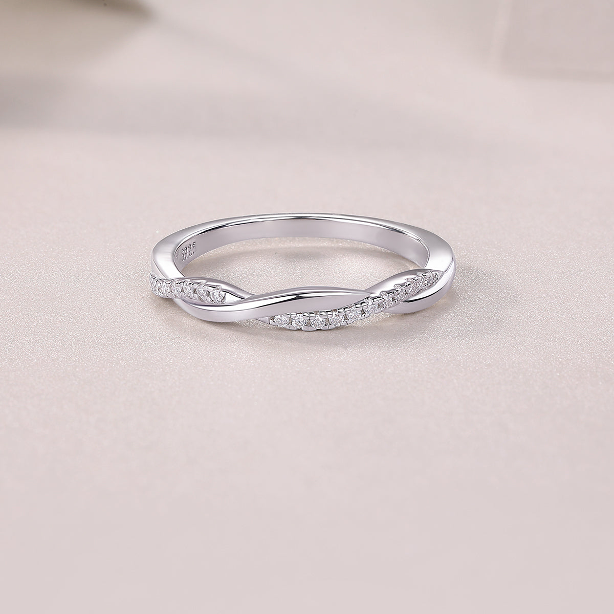 Close-up of moissanite stone on FreyaVibe platinum-plated S925 silver wedding ring