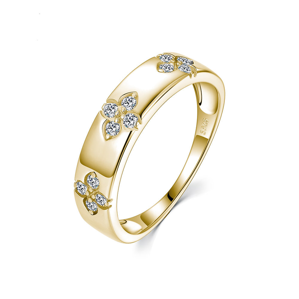 S925 silver floral cluster moissanite ring in gold finish on white background
