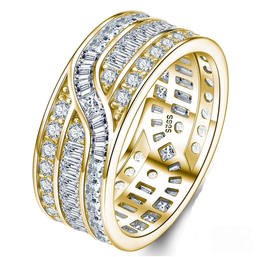 Wide moissanite eternity band worn on hand