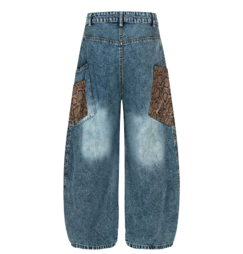 FreyaVibe men's loose wide-leg denim jeans front view — washed blue with python print pockets and mid-rise waist