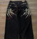 FreyaVibe men's black graphic embroidered jeans back full length — gold wing print and red artistic detailing