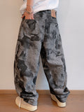 FreyaVibe tie-dye flare loose jeans back view — full length grey black all-over print with wide relaxed leg