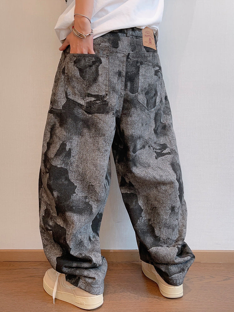 FreyaVibe tie-dye flare loose jeans back view — full length grey black all-over print with wide relaxed leg