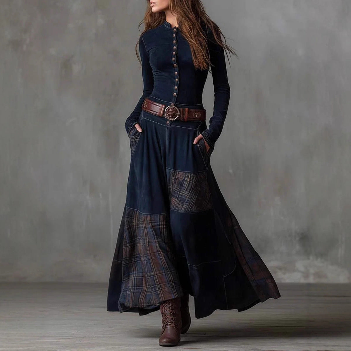 The Moorland Patchwork Maxi Dress FV in navy blue — button-front bodice with plaid panel wide-leg skirt, styled with leather belt and boots