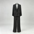 Polka dot blazer and wide leg trouser suit set in black – flat-lay showing full length trousers and single button blazer detail
