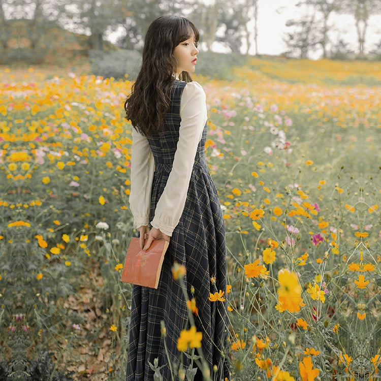 The Countryside Plaid Pinafore Dress FV — close-up of plaid fabric texture and high-waist pinafore silhouette