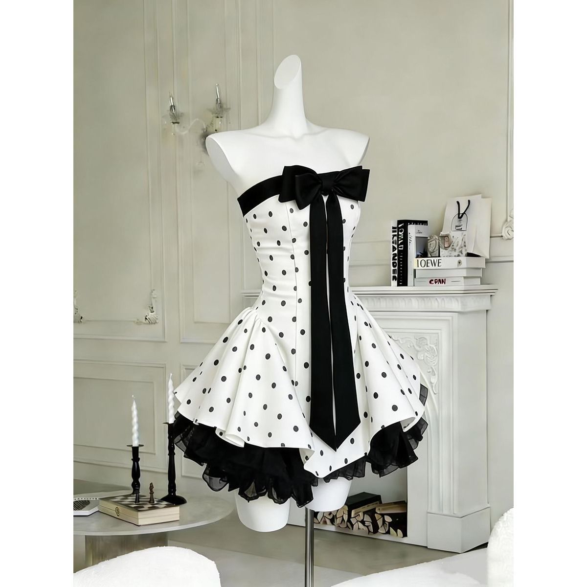 Polka dot strapless mini dress – three-quarter front view showing bodice structure and skirt volume
