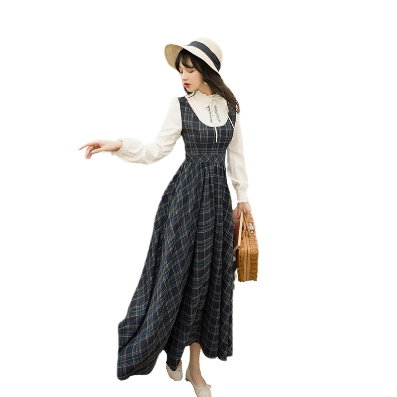 FreyaVibe Countryside Plaid Pinafore Dress — layered over cream blouse with straw hat and wicker bag, heritage countryside styling