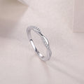 Close-up of moissanite stone on FreyaVibe platinum-plated S925 silver wedding ring
