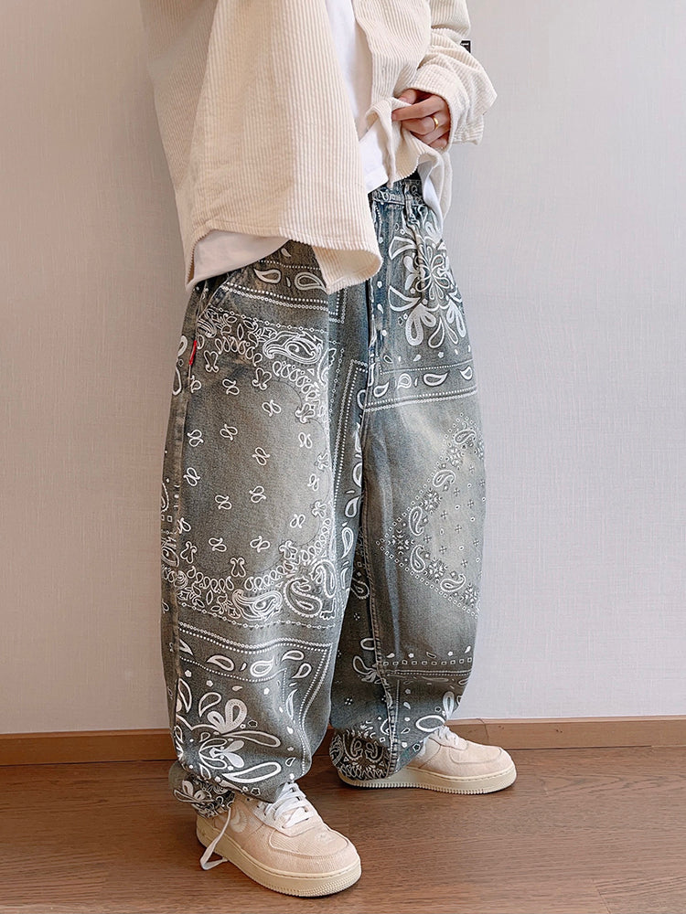 FreyaVibe men's paisley print loose straight jeans — side full length view showing relaxed wide-leg fit in washed blue bandana print